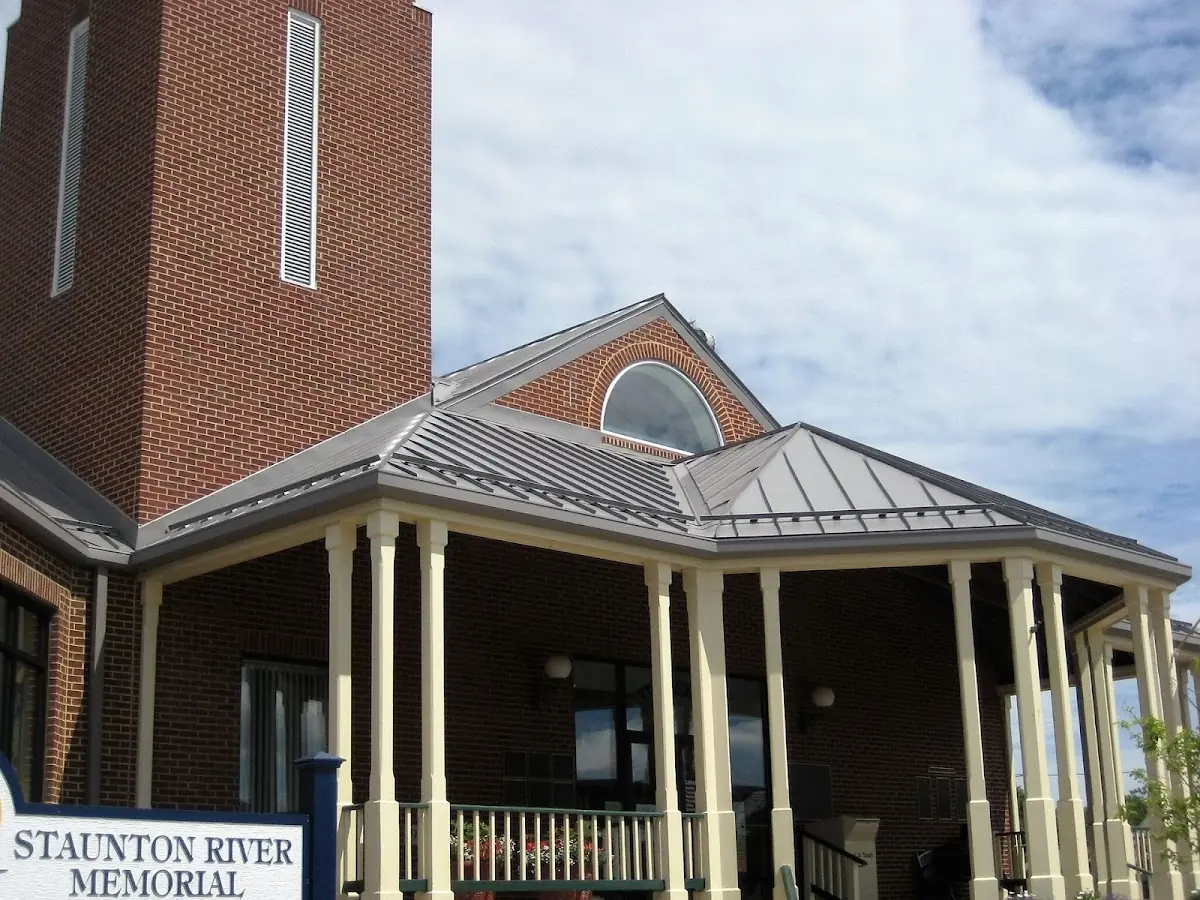 Skilled roofing craftsmen working on a residential roof in Virginia Meadows Industrial Park